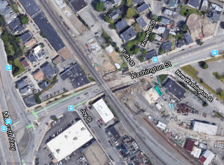 The City of Somerville plans to install physically-protected bus and bike lanes on this section of Washington Street east of the McGrath Highway with "Shared Streets and Spaces" grant funding from MassDOT.