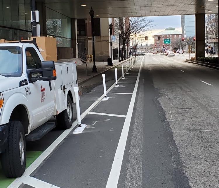 Building Back Flimsier: Flexposts Replace Concrete Curbs for Mass. Ave. Bike Lanes