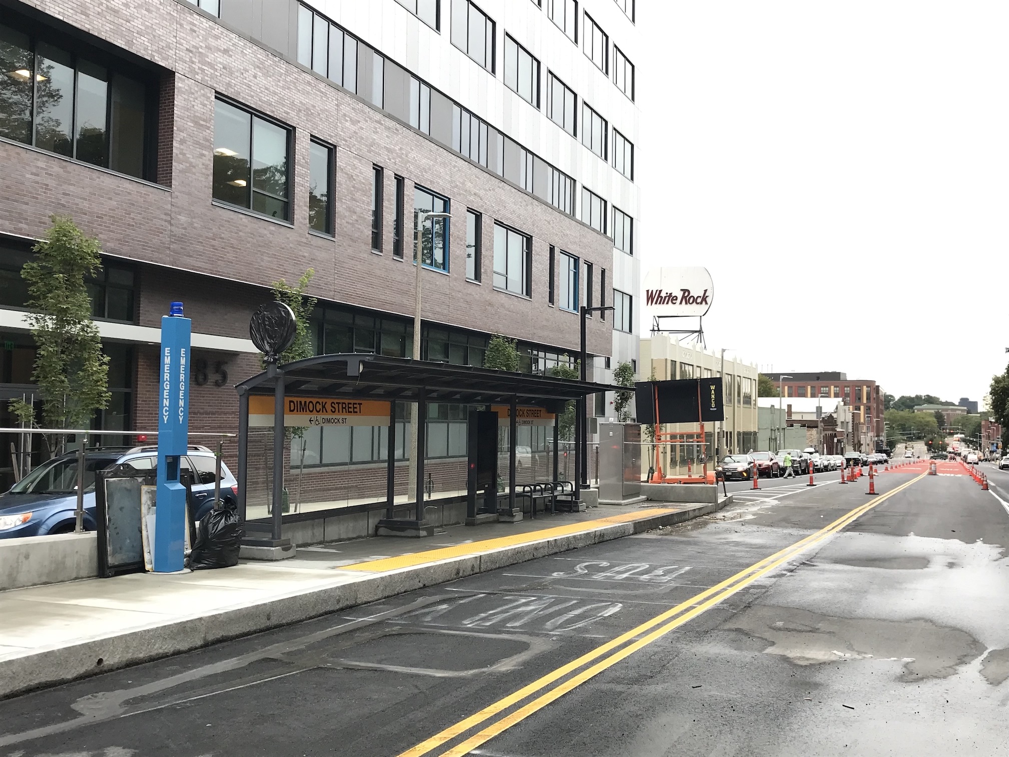 The new "gold standard" bus stop at Dimock Street in the Columbus Avenue busway includes fare vending machines (not yet installed), real-time information displays, and near-level boarding platforms.