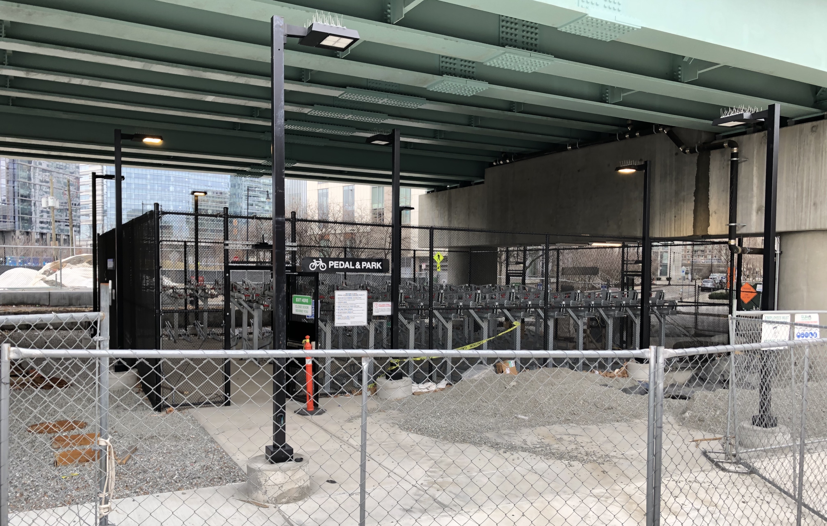 A new "pedal and park" bike parking area has been installed in the shelter of the new Lechmere Green Line station near the end of the Community Path extension. 