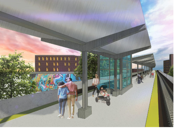 Commuter Rail platform featuring a gray shade canopy under which a couple can be seen walking together, a woman pushes a stroller and others further down sit or stand as they wait for the train.