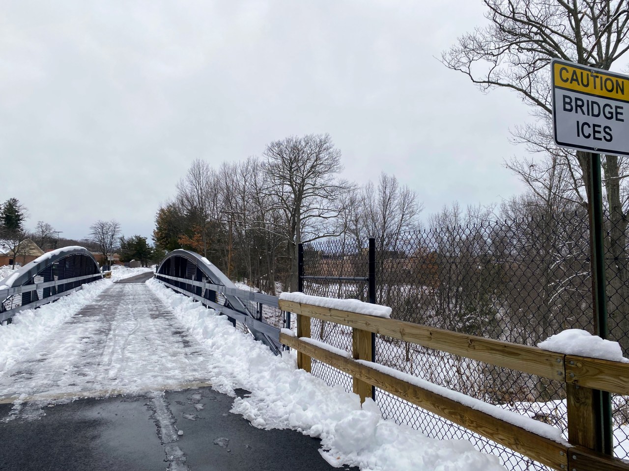 Bridge with a mix of slush and icy patches between Priest Street and the large shopping complex east of Route 12/N Main Street in Leominster, a little over a mile north of the southern trailhead. “Bridges are tough because they still get cold air underneath,” said DiNardo, adding that they may need to start using some salt – something the group was hoping to stay away from for environmental reasons.