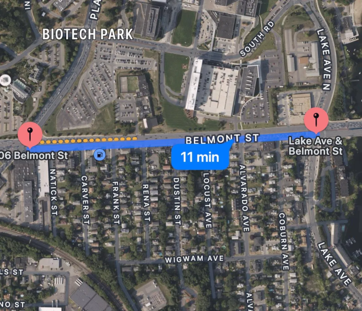 A satellite map of Belmont St. between Lake St. and Natick St. in Worcester, highlighting the half-mile distance between crosswalks as an 11-minute walk.