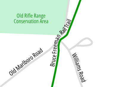 Locator map showing the junction of two roads labelled Old Marlboro Rd. and Williams Rd. and a green trail marked Bruce Freeman Rail Trail. All three routes converge in an intersection in the center of the map. 