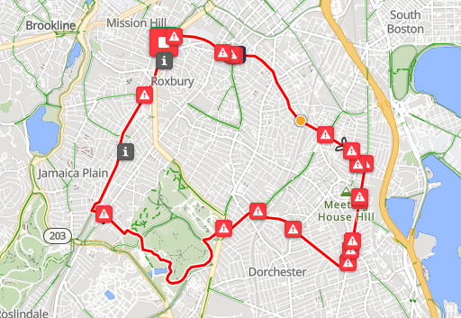 A red-lined map shows a bike route loop through Roxbury, Jamaica Plain, and Dorchester.