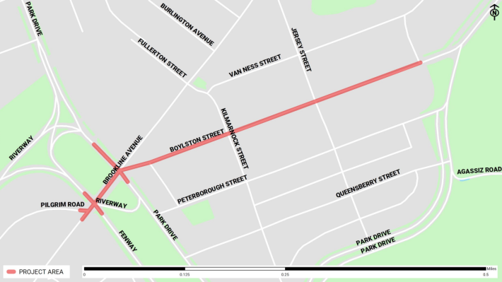 A map of the Fenway neighborhood with a green band representing the Fens parkland wrapping around the left, lower, and right edge of the map in a U shape, and Boylston Street highlighted as a diagonal line from lower left to upper right through the center of the map. 